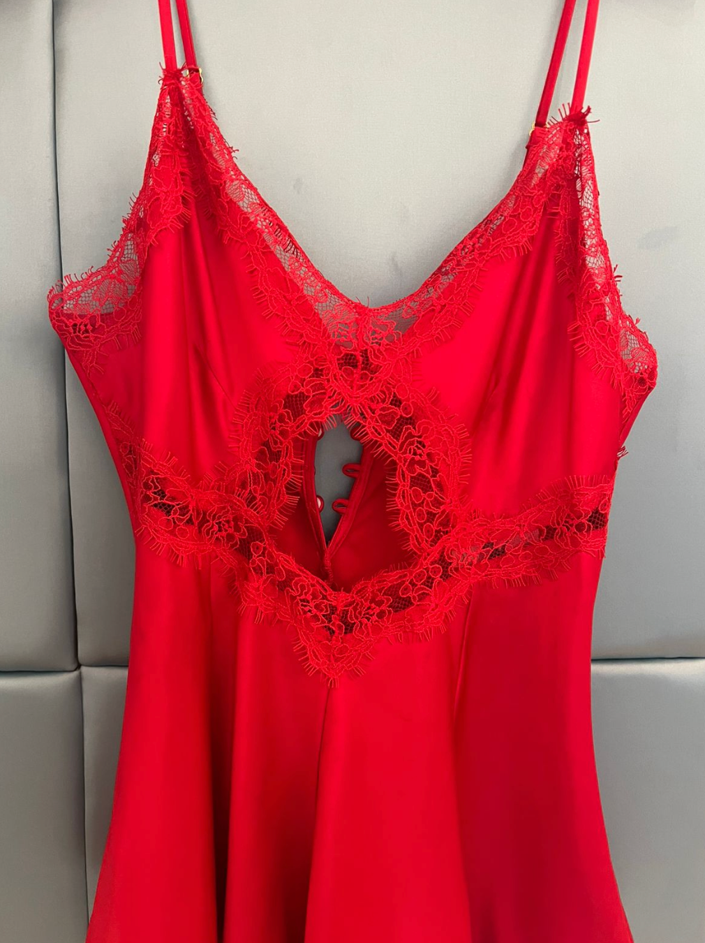 Body rojo con botones en la espalda